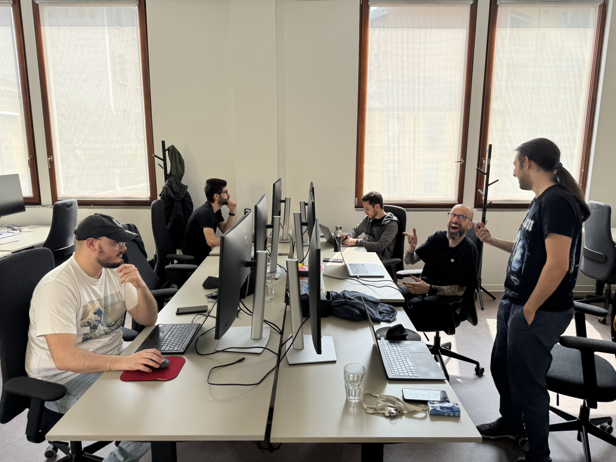 group photo of attendees developing software you can love