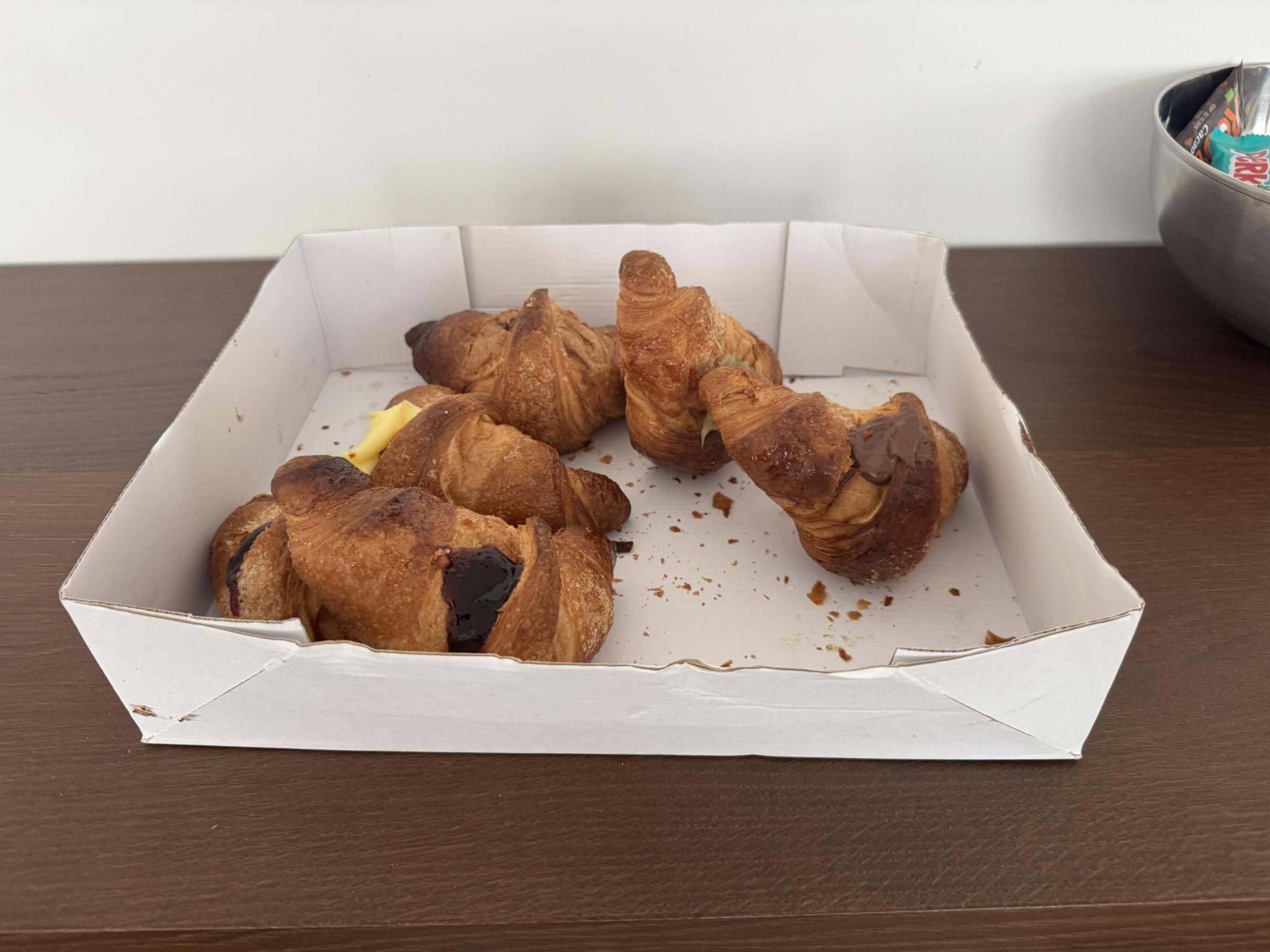 Croissants offered to attendees, stuffed with various jams and creams to improve development speed